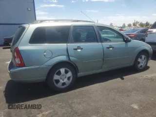 2004 Ford Focus SE with VIN 1FAFP36384W191801, listed as a Copart auction lot 63661465 with 144,226 mi miles and Salvage title. Bid and sale history available at DreamBid. Image 3.