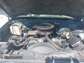 1995 GMC Suburban z VIN 1GKFK16K9SJ728534, wystawiony jako IAAI lot #42358029 z przebiegiem 279 148 mil mil oraz . Historia ofert i sprzedaży dostępna na DreamBid. Obrazek 10.