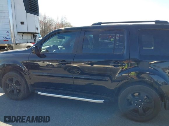 2014 Honda Pilot EX-L with VIN 5FNYF4H51EB025328, listed as a IAAI auction lot 41787439 with 169,313 mi miles and . Bid and sale history available at DreamBid. Image 14.