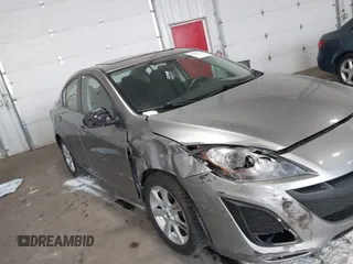 2011 Mazda Mazda3 i Touring with VIN JM1BL1VFXB1900999, listed as a IAAI auction lot 42067239 with 202,829 mi miles. Bid and sale history available at carsss.com. Image 6.