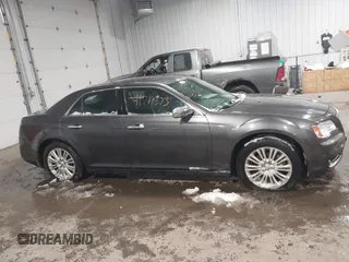 2014 Chrysler 300 C with VIN 2C3CCAKG8EH345577, listed as a IAAI auction lot 41719373 with 152,081 mi miles and . Bid and sale history available at carsss.com. Image 13.