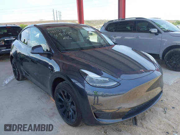 2024 Tesla Model Y Long Range z VIN 7SAYGDEE7RA229591, wystawiony jako IAAI lot #42194044 z przebiegiem 22 866 mil mil oraz . Historia ofert i sprzedaży dostępna na DreamBid. Obrazek 1.