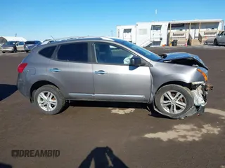2015 Nissan Rogue S with VIN JN8AS5MVXFW770931, listed as a IAAI auction lot 41575344 with 160,556 mi miles and . Bid and sale history available at carsss.com. Image 12.
