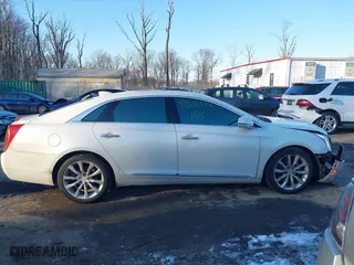 2015 Cadillac XTS Luxury with VIN 2G61N5S37F9182517, listed as a IAAI auction lot 41326594 with 175,663 mi miles. Bid and sale history available at carsss.com. Image 13.