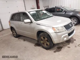 2012 Suzuki Grand Vitara Premium with VIN JS3TD0D62C4100440, listed as a IAAI auction lot 41711815 with 171,527 mi miles. Bid and sale history available at carsss.com. Image 1.