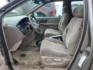 1999 Toyota Sienna CE with VIN 4T3ZF19C6XU148183, listed as a Copart auction lot 59323494 with 142,299 mi miles and Clean Title. Bid and sale history available at carsss.com. Image 7.