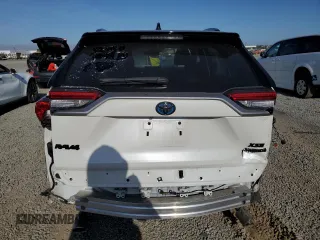 2021 Toyota RAV4 Hybrid XSE with VIN 2T3E6RFV1MW018990, listed as a Copart auction lot 64043865 with 55,938 mi miles and Salvage title. Bid and sale history available at DreamBid. Image 6.