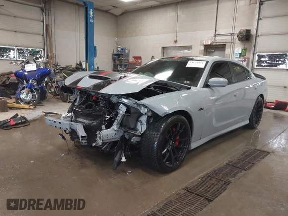 2021 Dodge Charger Scat Pack Widebody with VIN 2C3CDXGJ4MH540627, listed as a IAAI auction lot 41171991 with 31,394 mi miles and . Bid and sale history available at DreamBid. Image 6.