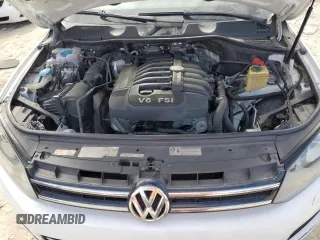 2012 Volkswagen Touareg Exec with VIN WVGEF9BP1CD008717, listed as a Copart auction lot 86095164 with 211,089 mi miles and Clean Title. Bid and sale history available at DreamBid. Image 12.