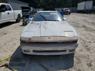 1986 Toyota Supra z VIN JT2MA70L7G0014661, wystawiony jako Copart lot #72161554 z przebiegiem 160 516 mil mil oraz Czysty tytuł • Clean title. Historia ofert i sprzedaży dostępna na DreamBid. Obrazek 5.