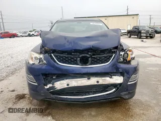 2012 Mazda CX-9 Grand Touring z VIN JM3TB2DA4C0359028, wystawiony jako Copart lot #53816845 z przebiegiem 148 848 mil mil oraz Szkoda całkowita • Salvage title. Historia ofert i sprzedaży dostępna na DreamBid. Obrazek 5.