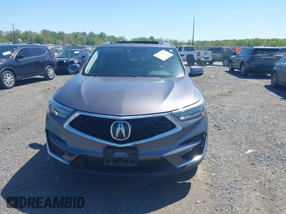 2020 Acura RDX Technology with VIN 5J8TC2H54LL019140, listed as a IAAI auction lot 42102793 with 56,519 mi miles and . Bid and sale history available at DreamBid. Image 12.