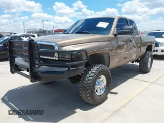 2001 Dodge 2500 z VIN 3B7KF236X1G711561, wystawiony jako IAAI lot #42168089 z przebiegiem 221 062 mil mil oraz . Historia ofert i sprzedaży dostępna na DreamBid. Obrazek 2.