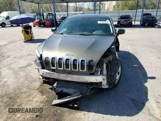 2015 Jeep Cherokee Sport z VIN 1C4PJLAB5FW573186, wystawiony jako Copart lot #61440805 z przebiegiem 144 333 mil mil oraz Szkoda całkowita • Salvage title. Historia ofert i sprzedaży dostępna na DreamBid. Obrazek 14.