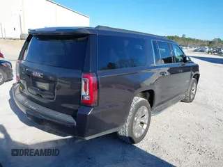 2015 GMC Yukon XL SLT with VIN 1GKS1HKC0FR675450, listed as a IAAI auction lot 41558343 with 187,814 mi miles. Bid and sale history available at carsss.com. Image 4.