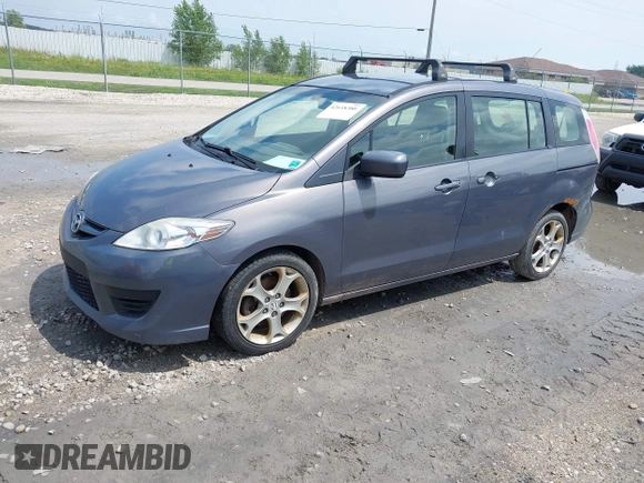 2010 Mazda 5 Sport with VIN JM1CR2W31A0375560, listed as a IAAI auction lot 42618380 with 171,910 mi miles and . Bid and sale history available at DreamBid. Image 2.