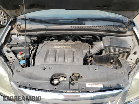 2006 Honda Odyssey EX z VIN 5FNRL38416B122268, wystawiony jako Copart lot #58969785 z przebiegiem 167 991 mil mil oraz Szkoda całkowita • Salvage title. Historia ofert i sprzedaży dostępna na DreamBid. Obrazek 12.