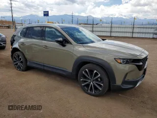 2023 Mazda CX-50 Premium z VIN 7MMVABDYXPN103342, wystawiony jako Copart lot #56426525 z przebiegiem 37 143 mil mil oraz Szkody całkowita. Historia ofert i sprzedaży dostępna na DreamBid. Obrazek 4.