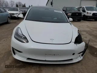 2022 Tesla Model 3 Long Range with VIN 5YJ3E1EB3NF353131, listed as a Copart auction lot 52582025 with 68,745 mi miles and Salvage Title. Bid and sale history available at carsss.com. Image 5.