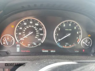 2017 BMW X5 xDrive35i with VIN 5UXKR0C56H0V68771, listed as a Copart auction lot 59587015 with 164,990 mi miles and Salvage title. Bid and sale history available at DreamBid. Image 9.