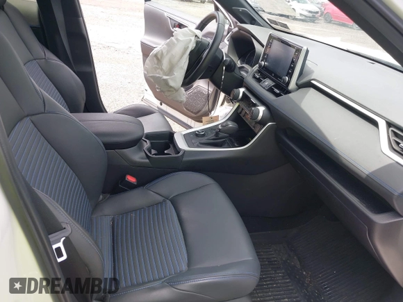 2021 Toyota RAV4 Hybrid XSE with VIN 4T3E6RFV9MU052563, listed as a IAAI auction lot 42295510 with 24,771 mi miles and . Bid and sale history available at DreamBid. Image 5.