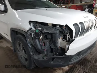 2014 Jeep Cherokee Latitude with VIN 1C4PJMCS5EW288909, listed as a IAAI auction lot 41531117 with 108,971 mi miles and . Bid and sale history available at carsss.com. Image 6.