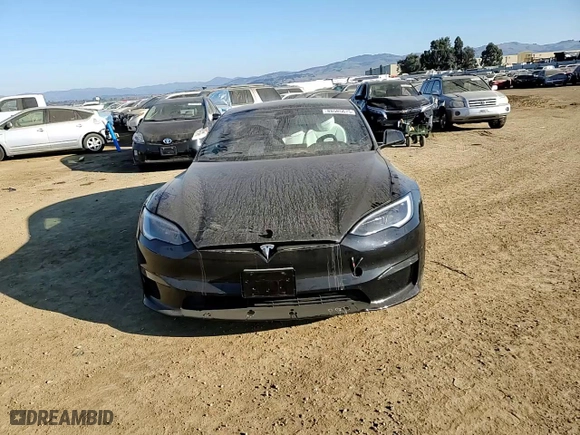 2023 Tesla Model S with VIN 5YJSA1E52PF499802, listed as a Copart auction lot 88585675 with 0 mi miles and Salvage Title. Bid and sale history available at carsss.com. Image 10.