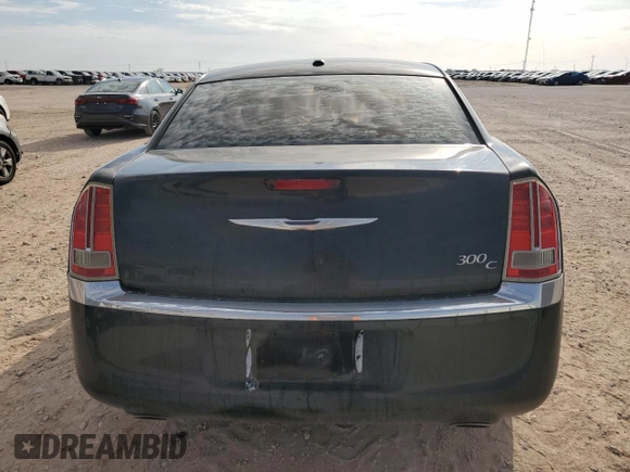2013 Chrysler 300 C z VIN 2C3CCAET3DH509566, wystawiony jako Copart lot #53388655 z przebiegiem 132 952 mil mil oraz Czysty tytuł • Clean title. Historia ofert i sprzedaży dostępna na DreamBid. Obrazek 6.