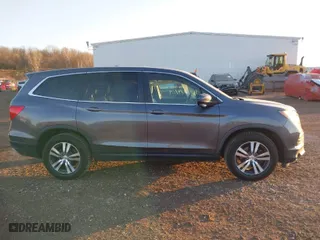 2017 Honda Pilot EX-L with VIN 5FNYF5H56HB020703, listed as a IAAI auction lot 41366342 with 96,618 mi miles. Bid and sale history available at carsss.com. Image 13.