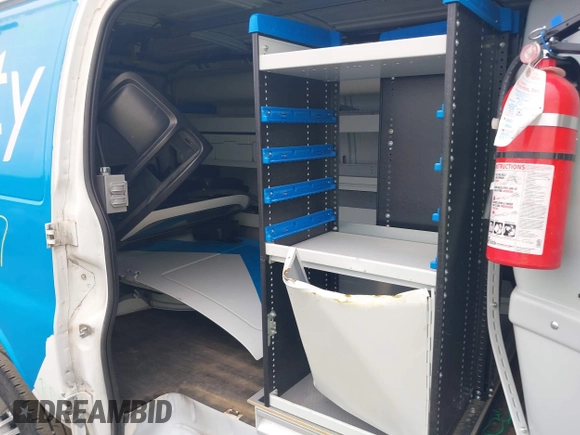 2015 Chevrolet Express Cargo Van with VIN 1GCWGFCF6F1152795, listed as a IAAI auction lot 41912147 with 101,265 mi miles. Bid and sale history available at carsss.com. Image 8.