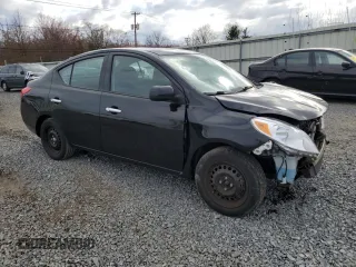 2014 Nissan Versa SV with VIN 3N1CN7AP6EL832846, listed as a Copart auction lot 50629065 with 52,260 mi miles and Salvage Title. Bid and sale history available at DreamBid. Image 4.