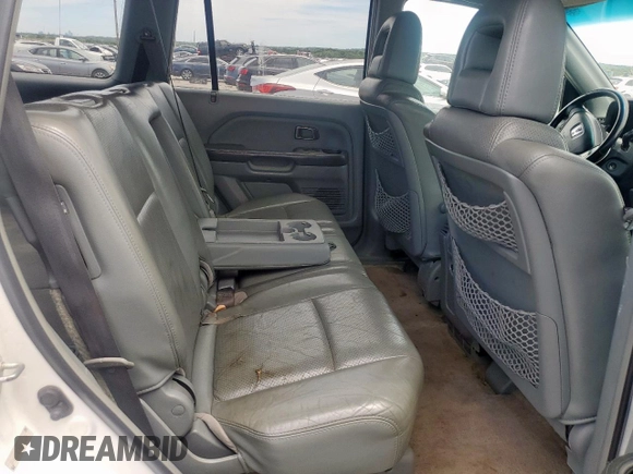 2005 Honda Pilot EX-L z VIN 5FNYF18555B025184, wystawiony jako Copart lot #58084295 z przebiegiem 161 863 mil mil oraz Szkoda całkowita • Salvage title. Historia ofert i sprzedaży dostępna na DreamBid. Obrazek 11.