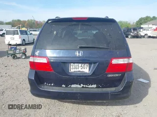 2005 Honda Odyssey EX with VIN 5FNRL38455B135555, listed as a IAAI auction lot 42080079 with 149,468 mi miles and . Bid and sale history available at carsss.com. Image 16.