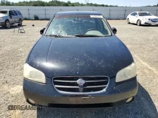 2000 Nissan Maxima GXE z VIN JN1CA31D6YT762114, wystawiony jako Copart lot #57908775 z przebiegiem 207 805 mil mil oraz Szkody całkowita. Historia ofert i sprzedaży dostępna na DreamBid. Obrazek 5.