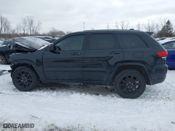 2018 Jeep Grand Cherokee Laredo E with VIN 1C4RJFAG0JC203148, listed as a IAAI auction lot 41614678 with 118,500 mi miles. Bid and sale history available at carsss.com. Image 15.