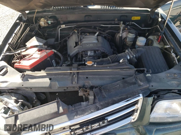 1999 Isuzu Trooper S z VIN JACDJ58X6X7912709, wystawiony jako Copart lot #75357874 z przebiegiem 138 332 mil mil oraz Szkoda całkowita • Salvage title. Historia ofert i sprzedaży dostępna na DreamBid. Obrazek 12.
