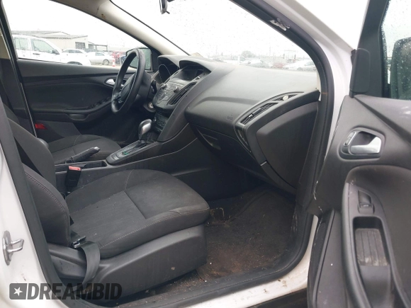 2018 Ford Focus SE z VIN 1FADP3F23JL225333, wystawiony jako IAAI lot #41758445 z przebiegiem 133 307 mil mil oraz . Historia ofert i sprzedaży dostępna na DreamBid. Obrazek 5.