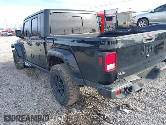 2023 Jeep Gladiator Sport S z VIN 1C6HJTAG7PL567903, wystawiony jako IAAI lot #41574387 z przebiegiem 49 378 mil mil oraz . Historia ofert i sprzedaży dostępna na DreamBid. Obrazek 3.