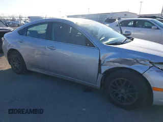 2012 Mazda 6 i Sport with VIN 1YVHZ8BH6C5M26710, listed as a IAAI auction lot 41593399 with 198,857 mi miles and . Bid and sale history available at DreamBid. Image 6.