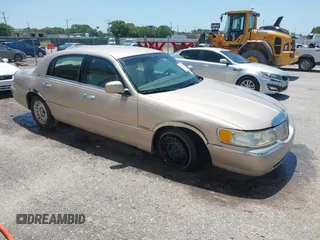 1998 Lincoln Town Car Executive с VIN 1LNFM81W2WY646212, выставлен на аукционе IAAI как лот 42525253 с пробегом 286 437 миль миль и . История ставок и продаж доступна на DreamBid. Изображение 1.