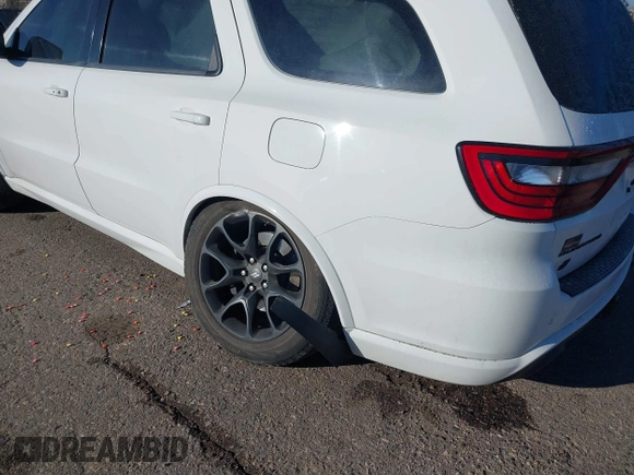 2021 Dodge Durango R/T with VIN 1C4SDJCT4MC663939, listed as a IAAI auction lot 40950558 with 52,054 mi miles and . Bid and sale history available at DreamBid. Image 6.