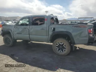 2023 Toyota Tacoma SR with VIN 3TMCZ5AN3PM563612, listed as a Copart auction lot 53995225 with 37,699 mi miles and Salvage title. Bid and sale history available at DreamBid. Image 2.