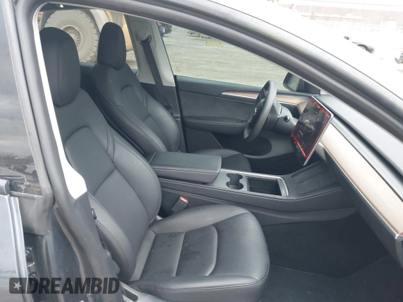 2023 Tesla Model Y Performance with VIN 7SAYGDEF2PF757113, listed as a IAAI auction lot 41881175 with 54,809 mi miles and . Bid and sale history available at DreamBid. Image 5.