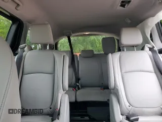 2023 Honda Odyssey Touring with VIN 5FNRL6H86PB024066, listed as a Copart auction lot 58414575 with 29,827 mi miles and Salvage title. Bid and sale history available at DreamBid. Image 10.
