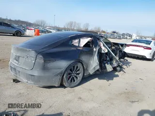 2016 Tesla Model S 90D with VIN 5YJSA1E42GF143731, listed as a IAAI auction lot 41394839 with Not provided miles and . Bid and sale history available at DreamBid. Image 4.
