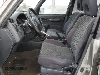 2000 Toyota RAV4 z VIN JT3HP10V9Y7166931, wystawiony jako Copart lot #83844934 z przebiegiem Nie podano mil oraz Czysty tytuł • Clean title. Historia ofert i sprzedaży dostępna na DreamBid. Obrazek 7.