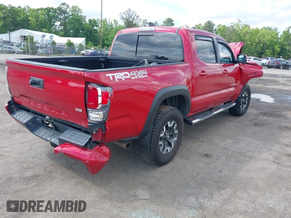 2021 Toyota Tacoma SR z VIN 5TFCZ5AN2MX263159, wystawiony jako IAAI lot #42273087 z przebiegiem 69 220 mil mil oraz . Historia ofert i sprzedaży dostępna na DreamBid. Obrazek 4.