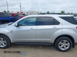 2014 Chevrolet Equinox LT z VIN 1GNALBEK1EZ117016, wystawiony jako IAAI lot #42428933 z przebiegiem 98 989 mil mil oraz . Historia ofert i sprzedaży dostępna na DreamBid. Obrazek 14.