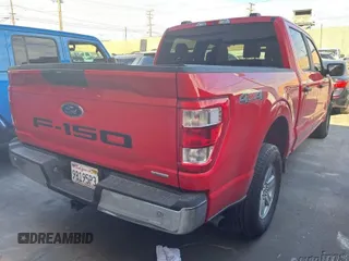 2022 Ford F-150 XL with VIN 1FTFW1E87NKE20380, listed as a IAAI auction lot 41959054 with 64,811 mi miles. Bid and sale history available at carsss.com. Image 1.