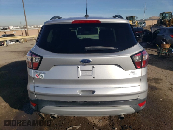 2018 Ford Escape SE with VIN 1FMCU0G96JUC38690, listed as a Copart auction lot 86504514 with 90,811 mi miles and Salvage Title. Bid and sale history available at carsss.com. Image 6.